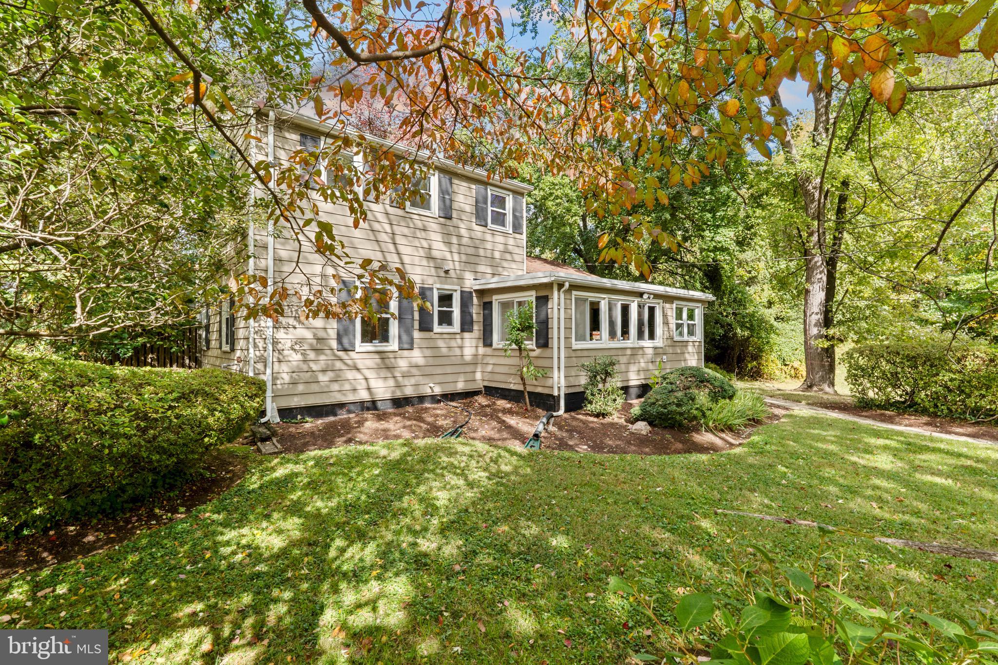 12312 Valleywood Drive Silver Spring, MD 20902 - Photo 2 of 65 front view of a house with a yard