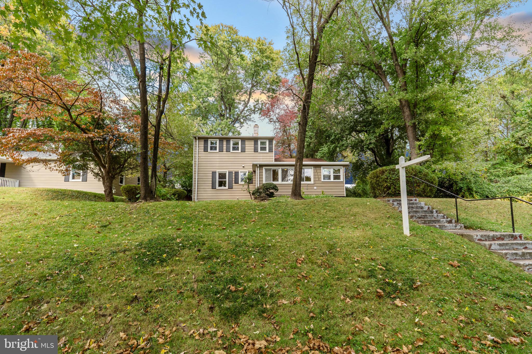 12312 Valleywood Drive Silver Spring, MD 20902 - Photo 46 of 65 a view of a house with backyard