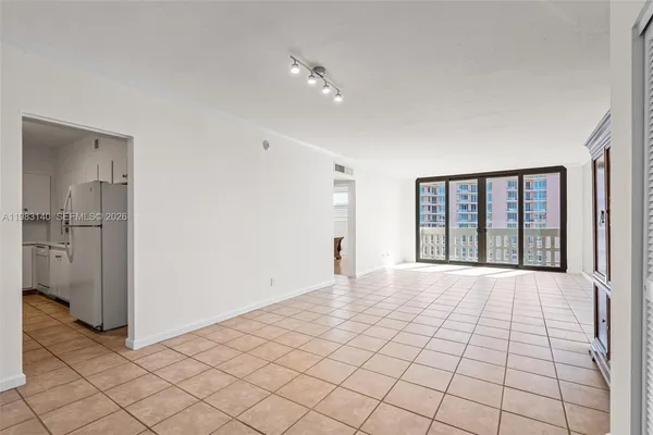 a view of an empty room and window
