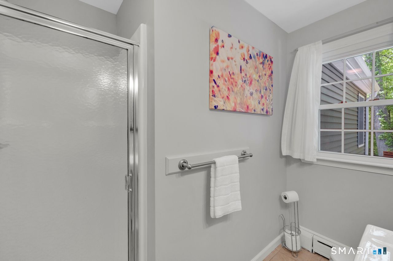 1013 Ratley Road Suffield, CT 06093 - Photo 23 of 39 a bathroom with a shower and a sink