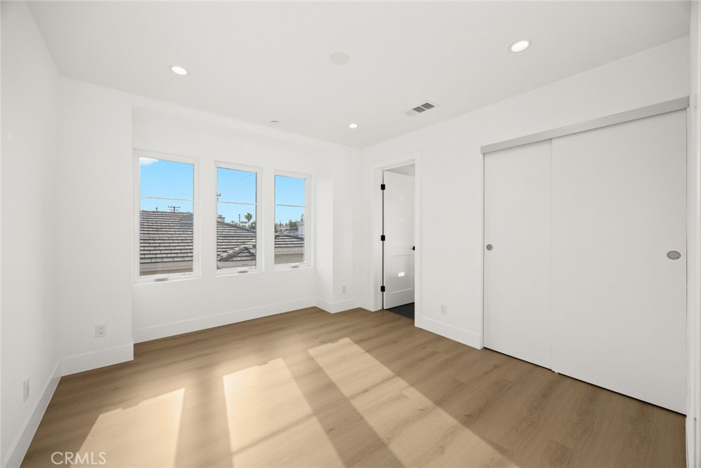 905 Sunset Boulevard, Unit A Arcadia, CA 91007 - Photo 20 of 35 a view of an empty room with a window