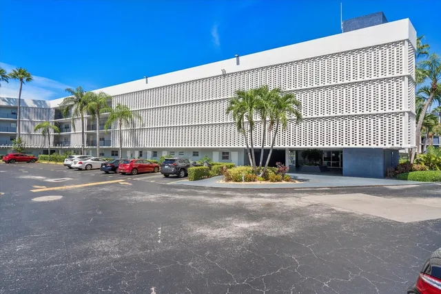a view of a street with cars
