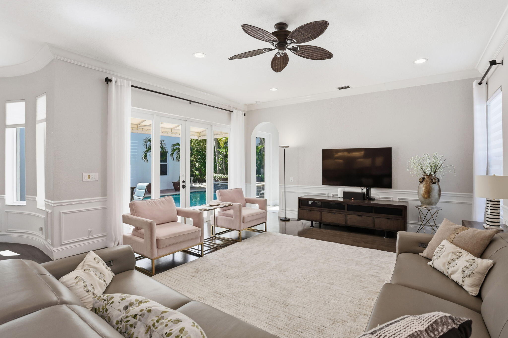375 Southwest 16th Street Boca Raton, FL 33432 - Photo 16 of 42 a living room with furniture and a flat screen tv