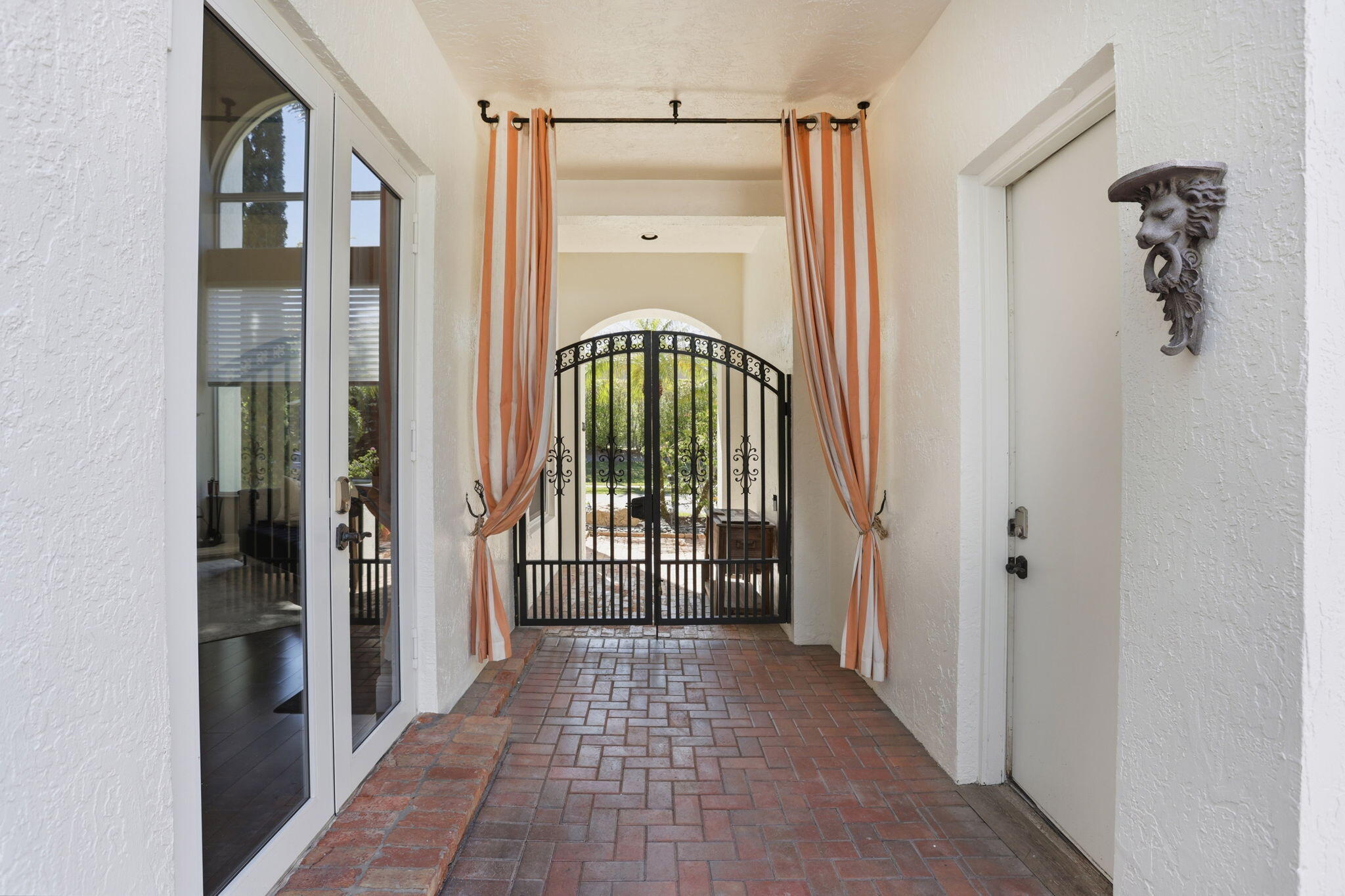 375 Southwest 16th Street Boca Raton, FL 33432 - Photo 2 of 42 a view of a hallway with a door