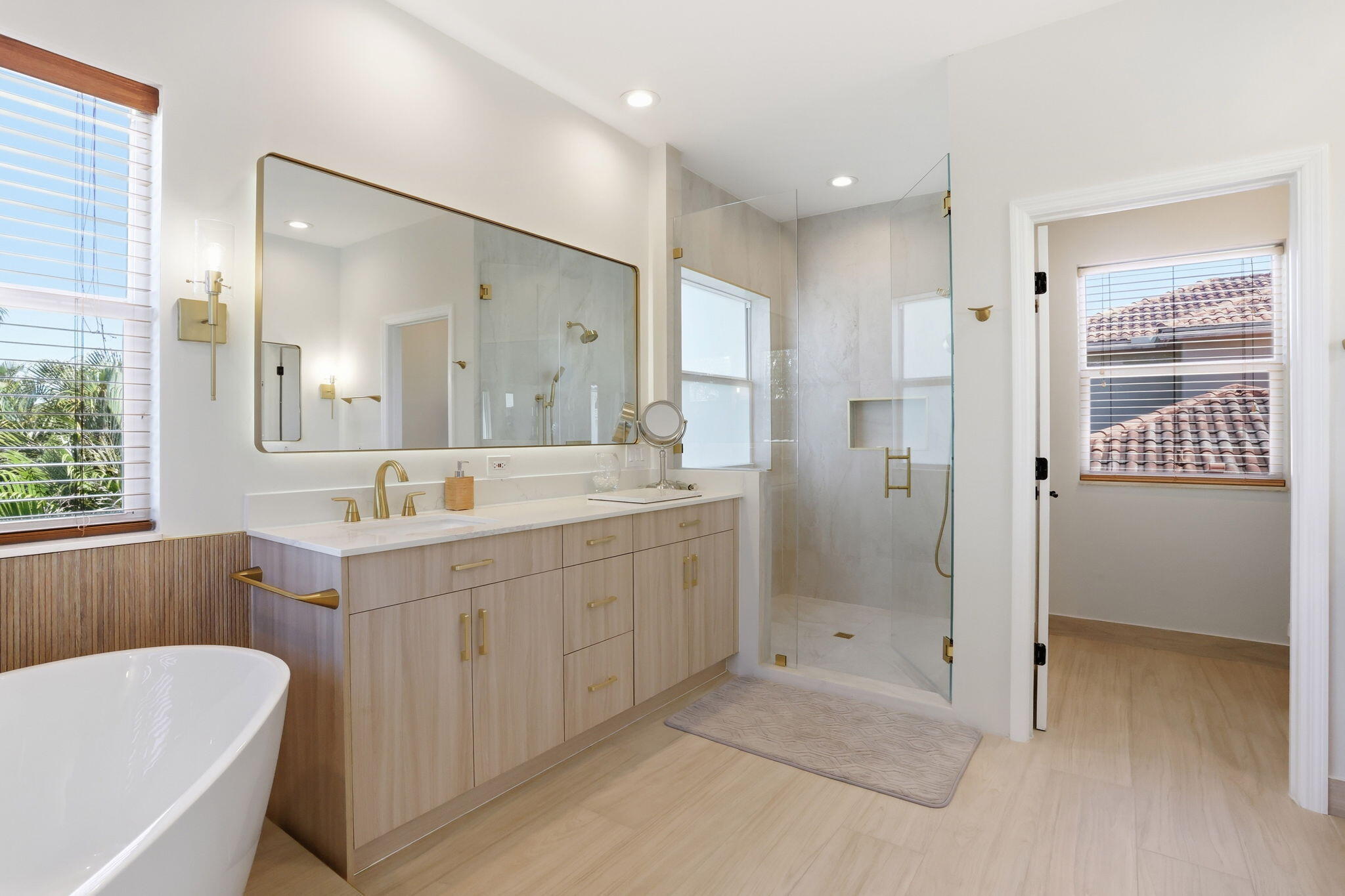 375 Southwest 16th Street Boca Raton, FL 33432 - Photo 24 of 42 a bathroom with a double vanity sink mirror and shower