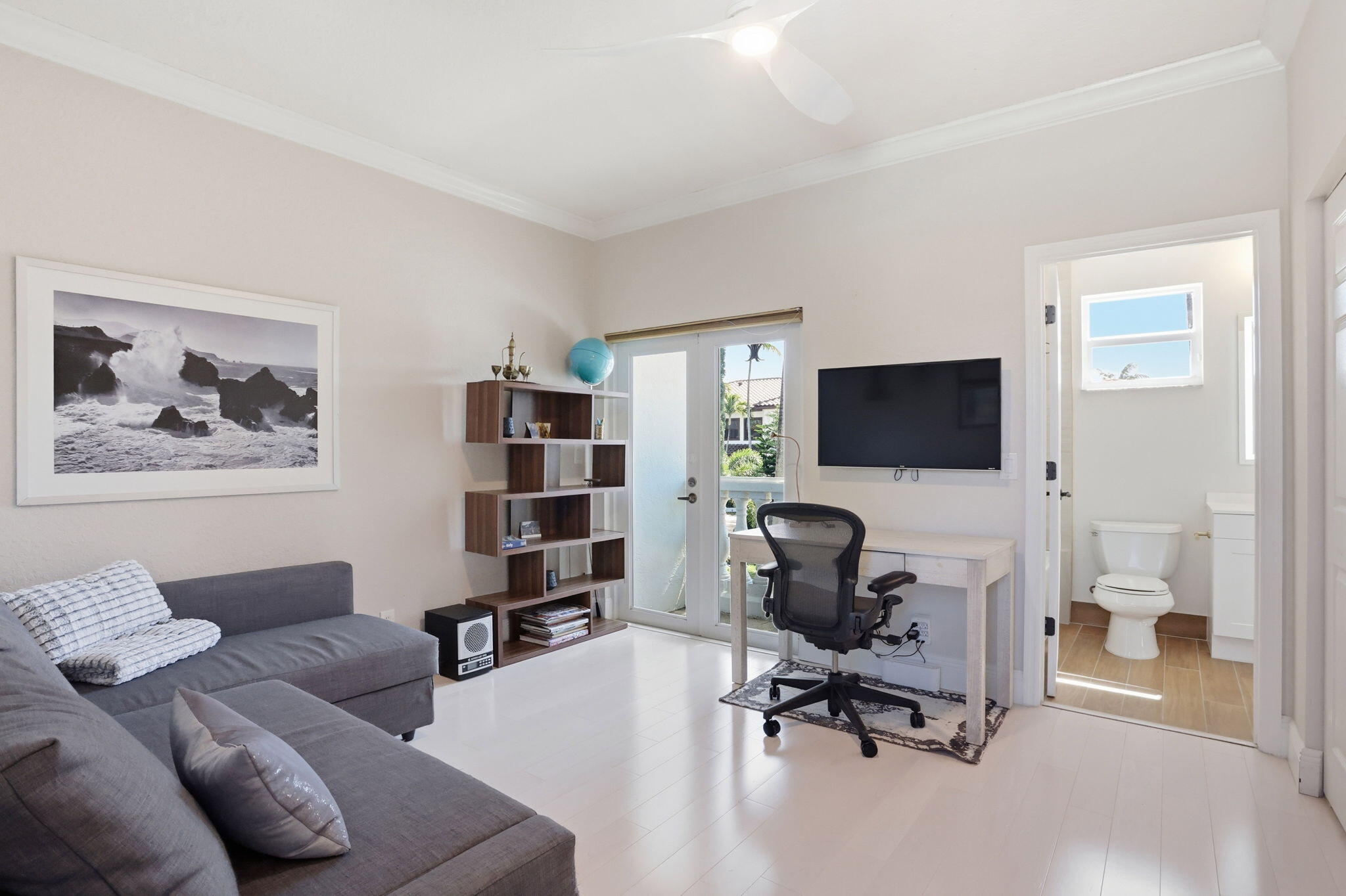 375 Southwest 16th Street Boca Raton, FL 33432 - Photo 30 of 42 a view of a livingroom with workspace and a couch