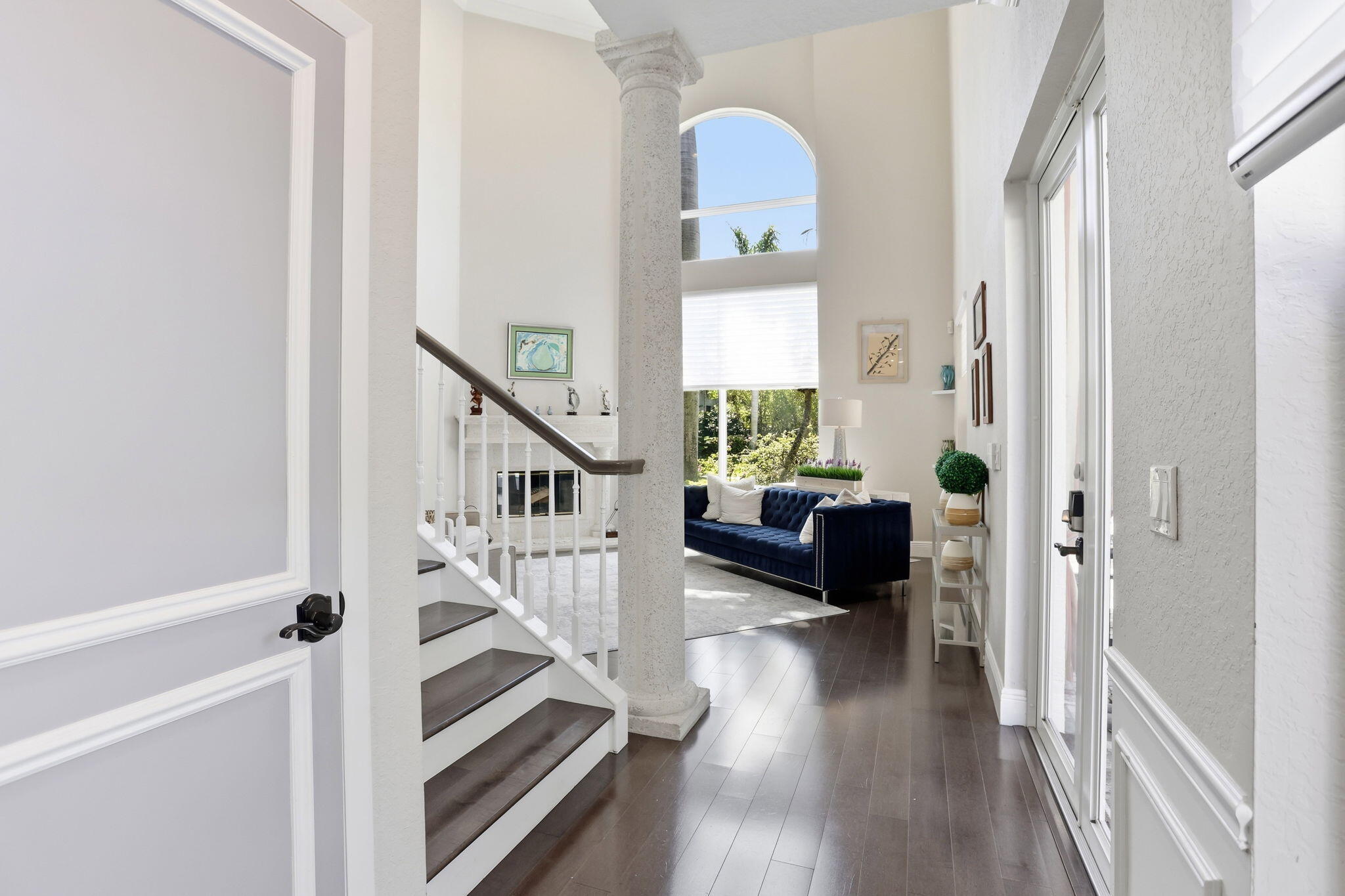 375 Southwest 16th Street Boca Raton, FL 33432 - Photo 5 of 42 a view of entryway and hall with wooden floor