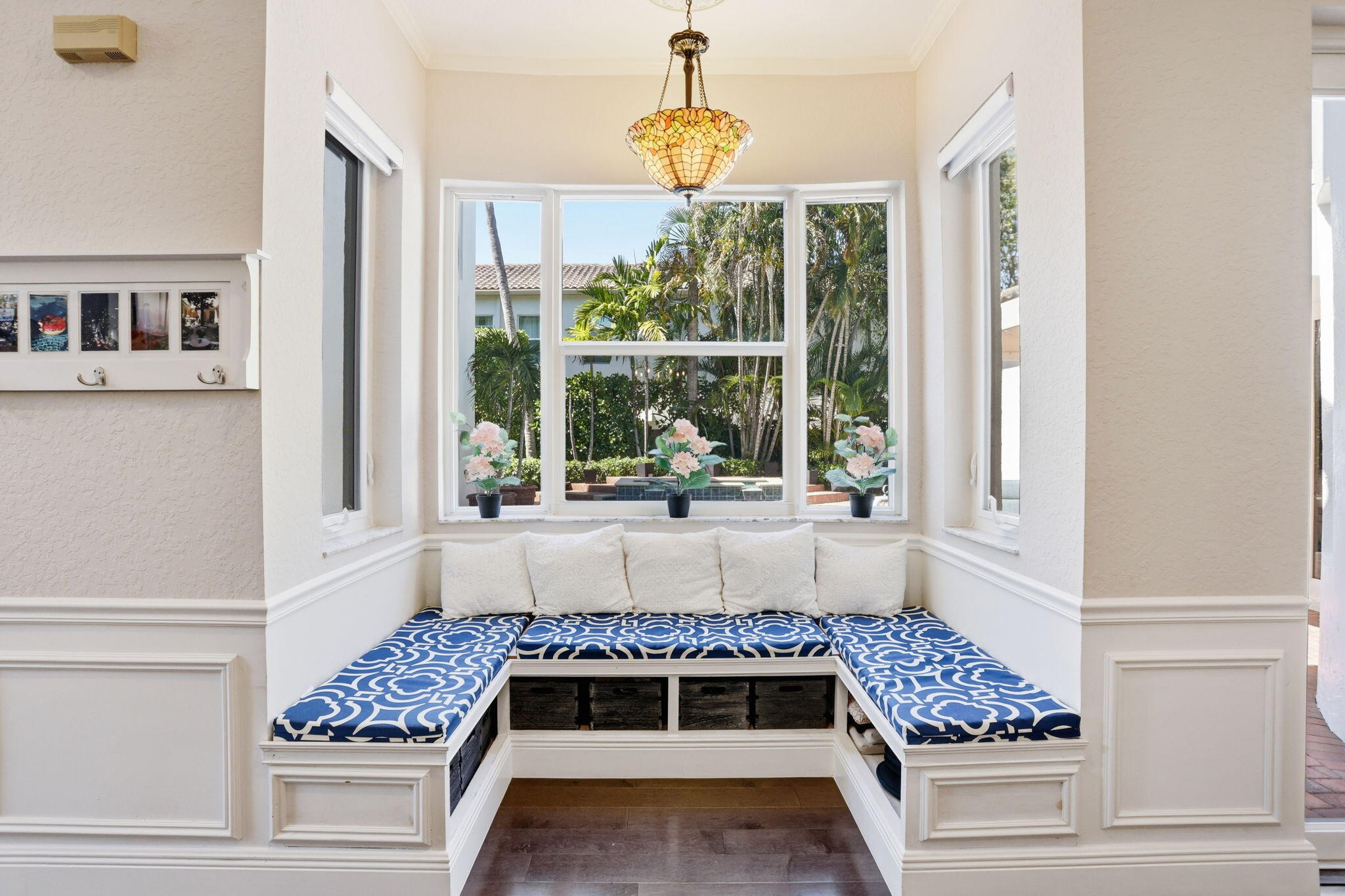 375 Southwest 16th Street Boca Raton, FL 33432 - Photo 10 of 42 a living room with a large window and a rug
