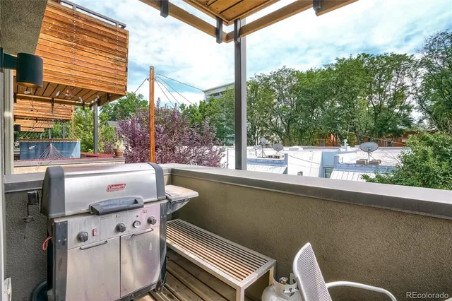 a view of a balcony with an outdoor space