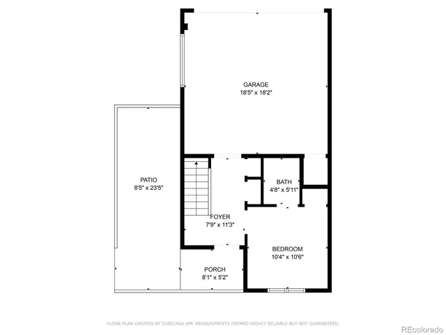 a picture of a bench in front of a wall