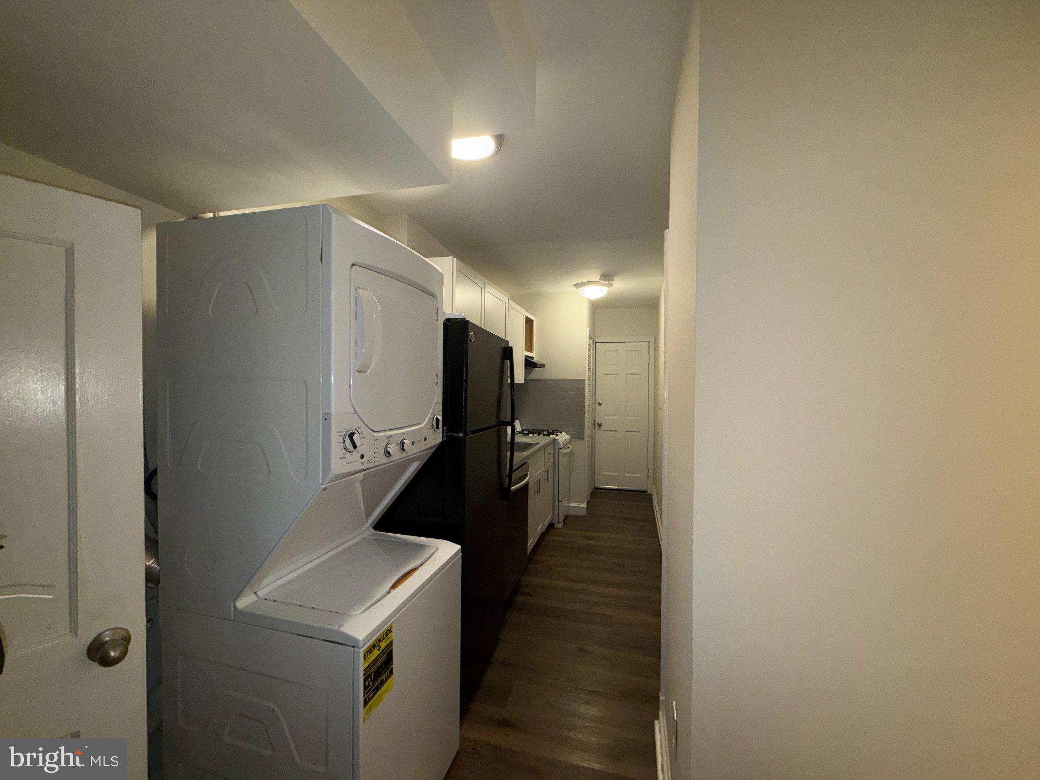 102 O Street Southwest, Unit 1 Washington, DC 20024 - Photo 10 of 18 Modern kitchen with laundry nook.