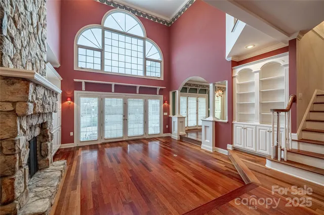 a view of livingroom with furniture wooden floor and windows