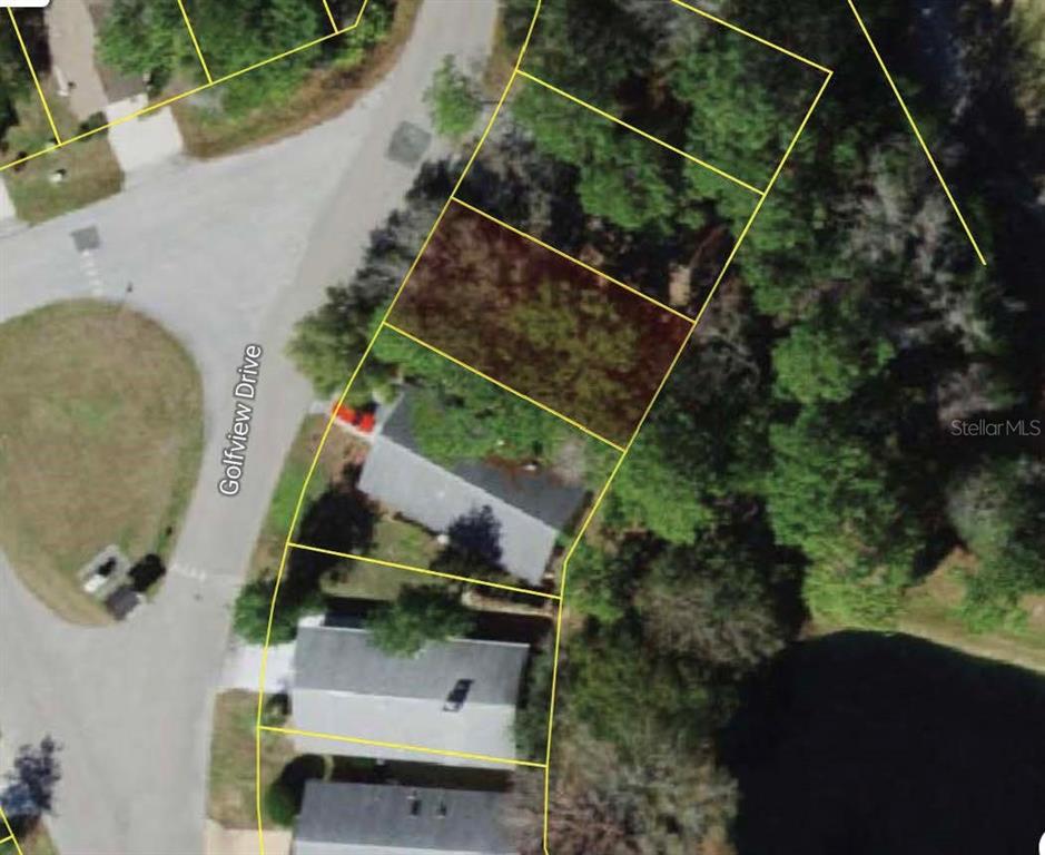49 Golfview Drive Homosassa, FL 34446 - Photo 2 of 2 an aerial view of house with outdoor space