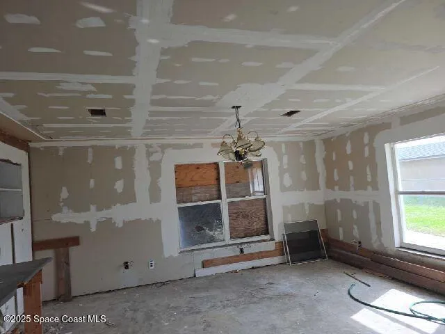 an empty room with windows