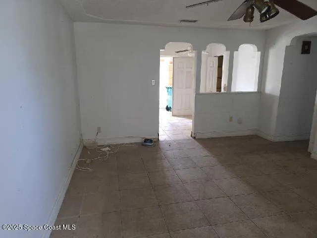 an empty room with windows