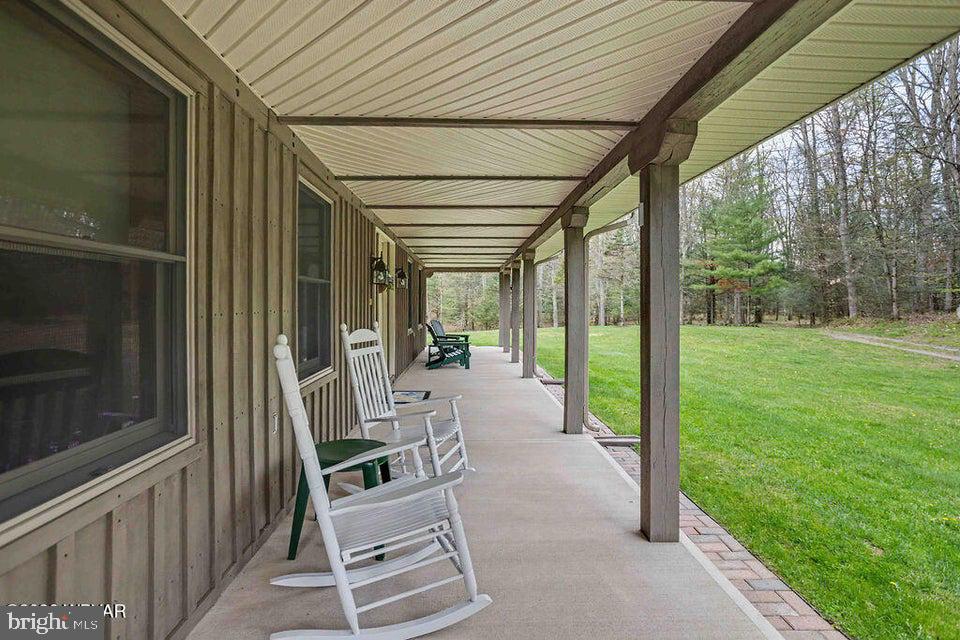 2270 Pine Tree Road Hughesville, PA 17737 - Photo 14 of 90 Serene porch with rocking chairs.