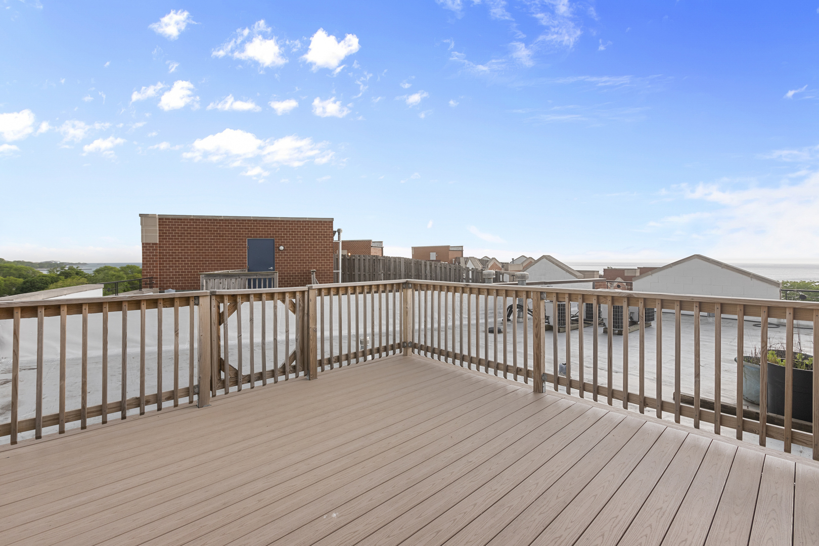7738 North Sheridan Road, Unit 4R Chicago, IL 60626 - Photo 17 of 18 a view of a balcony with wooden floor
