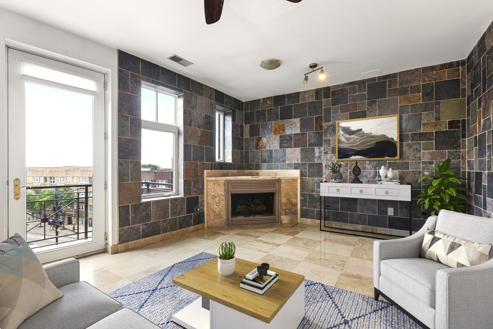 7738 North Sheridan Road, Unit 4R Chicago, IL 60626 - Photo 2 of 18 a living room with furniture and a fireplace