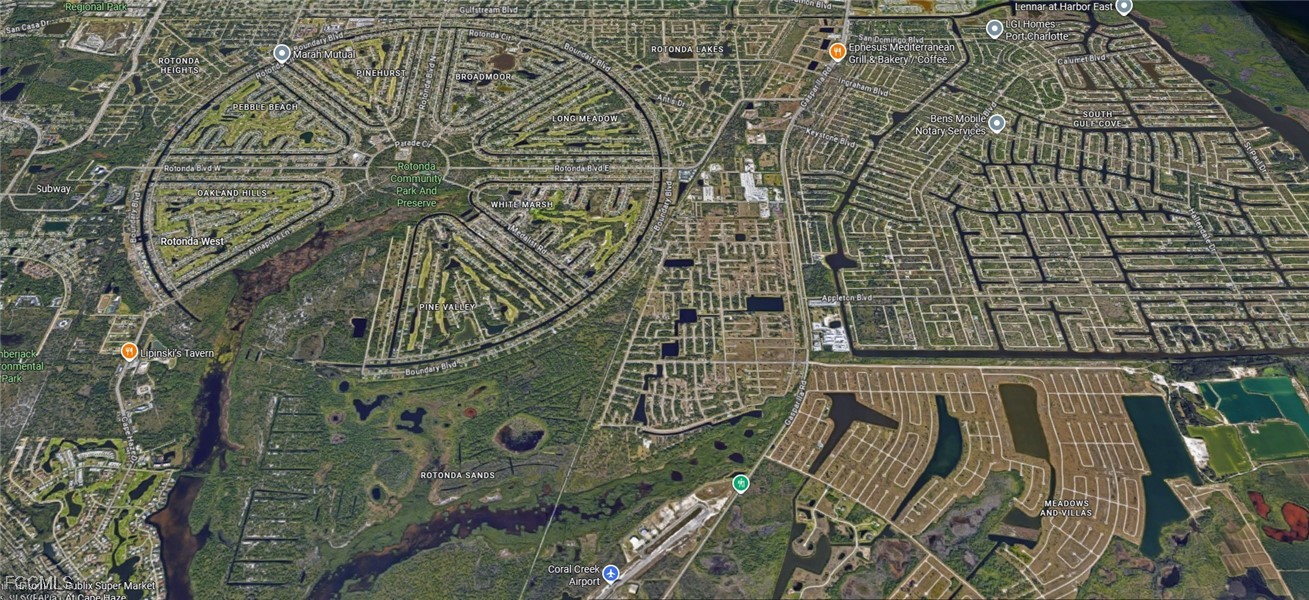 6 Boat Court Placida, FL 33946 - Photo 5 of 6 view of a brick building