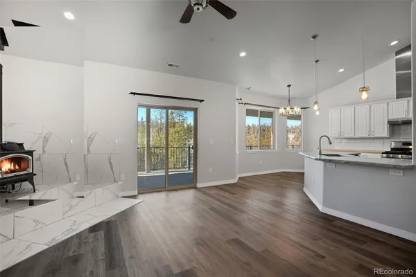 a view of kitchen and windows