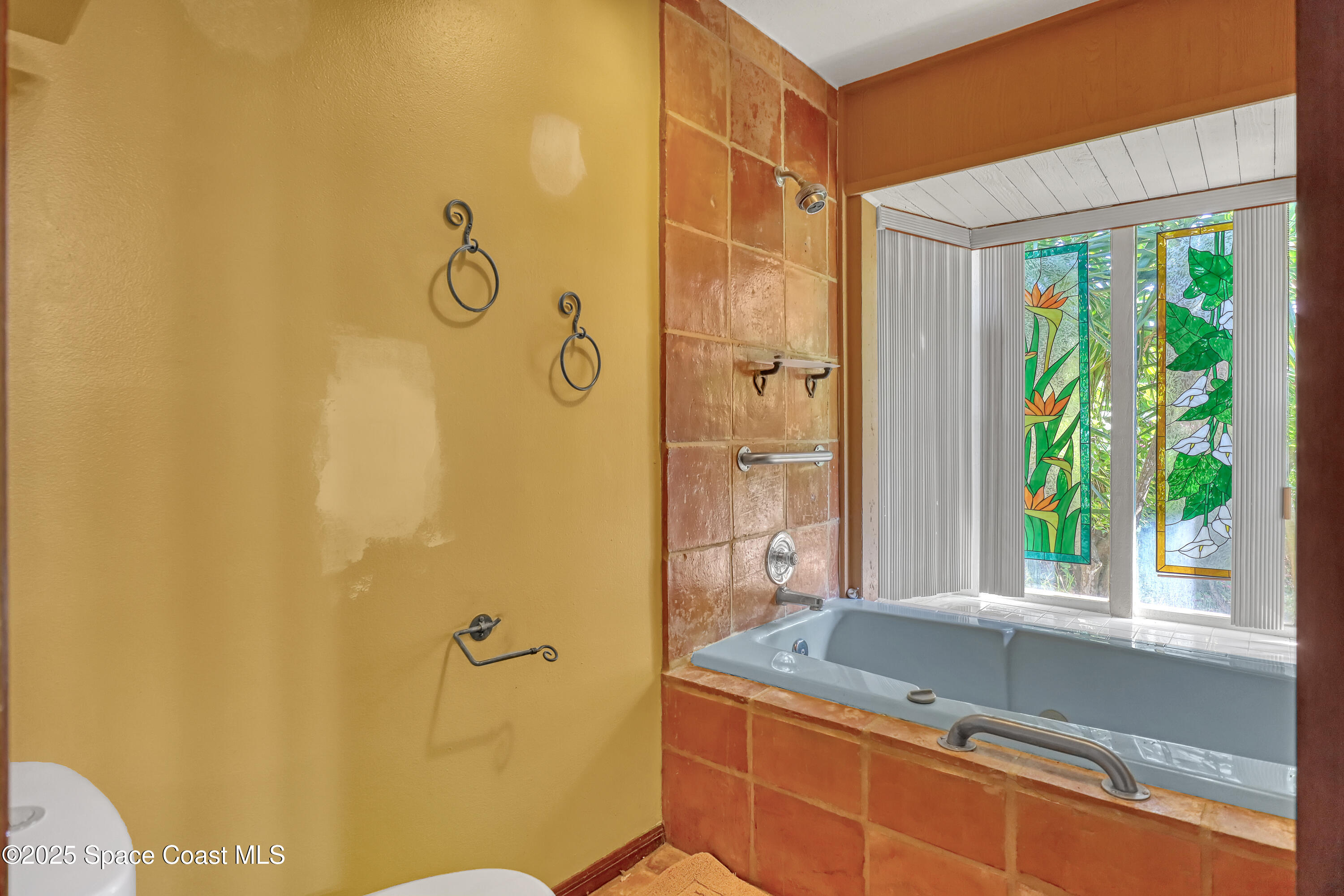 235 Sand Dollar Road Indialantic, FL 32903 - Photo 15 of 64 a bathroom with a granite countertop sink and a shower