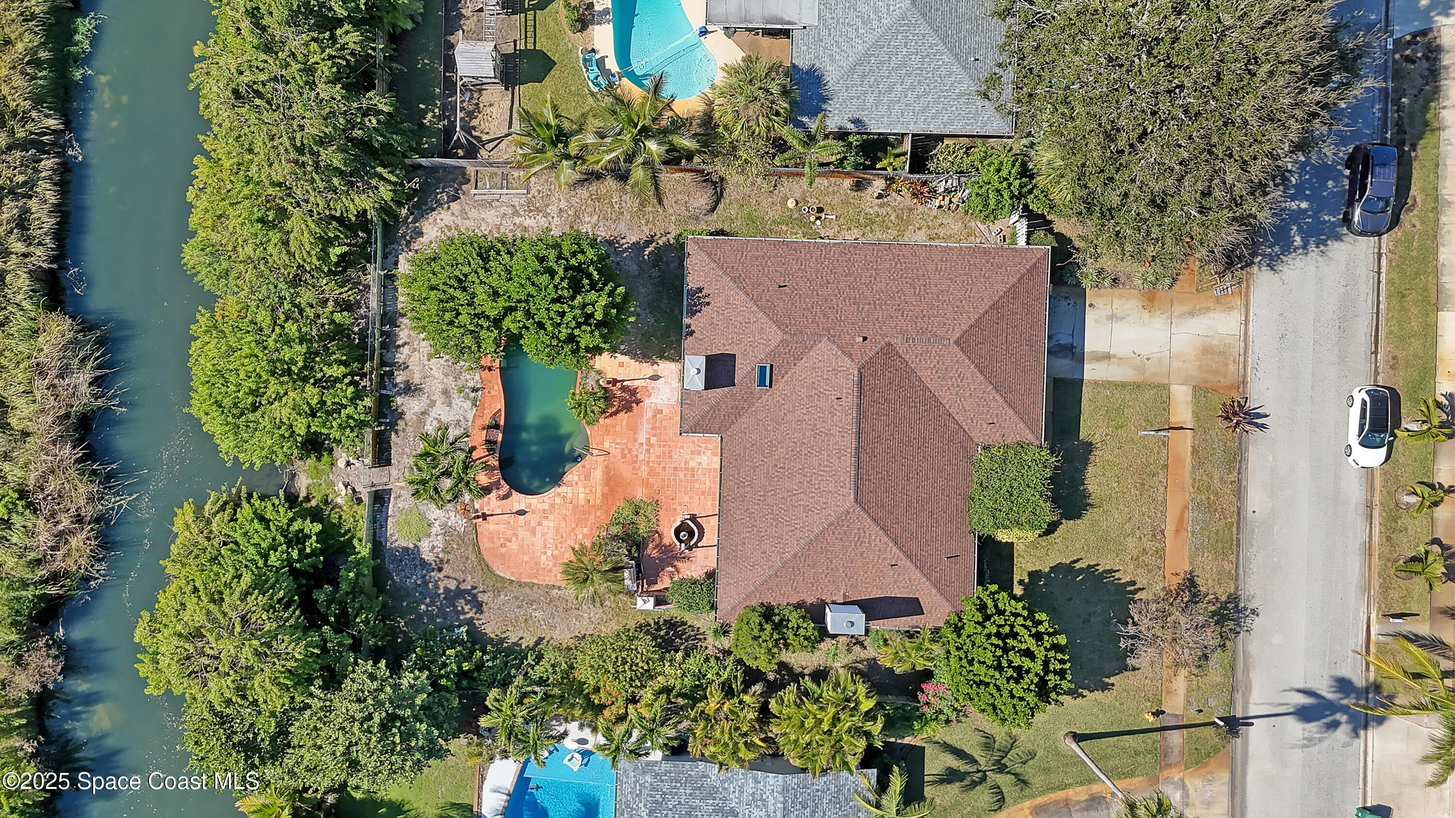 235 Sand Dollar Road Indialantic, FL 32903 - Photo 3 of 64 an aerial view of a house with a yard and garden