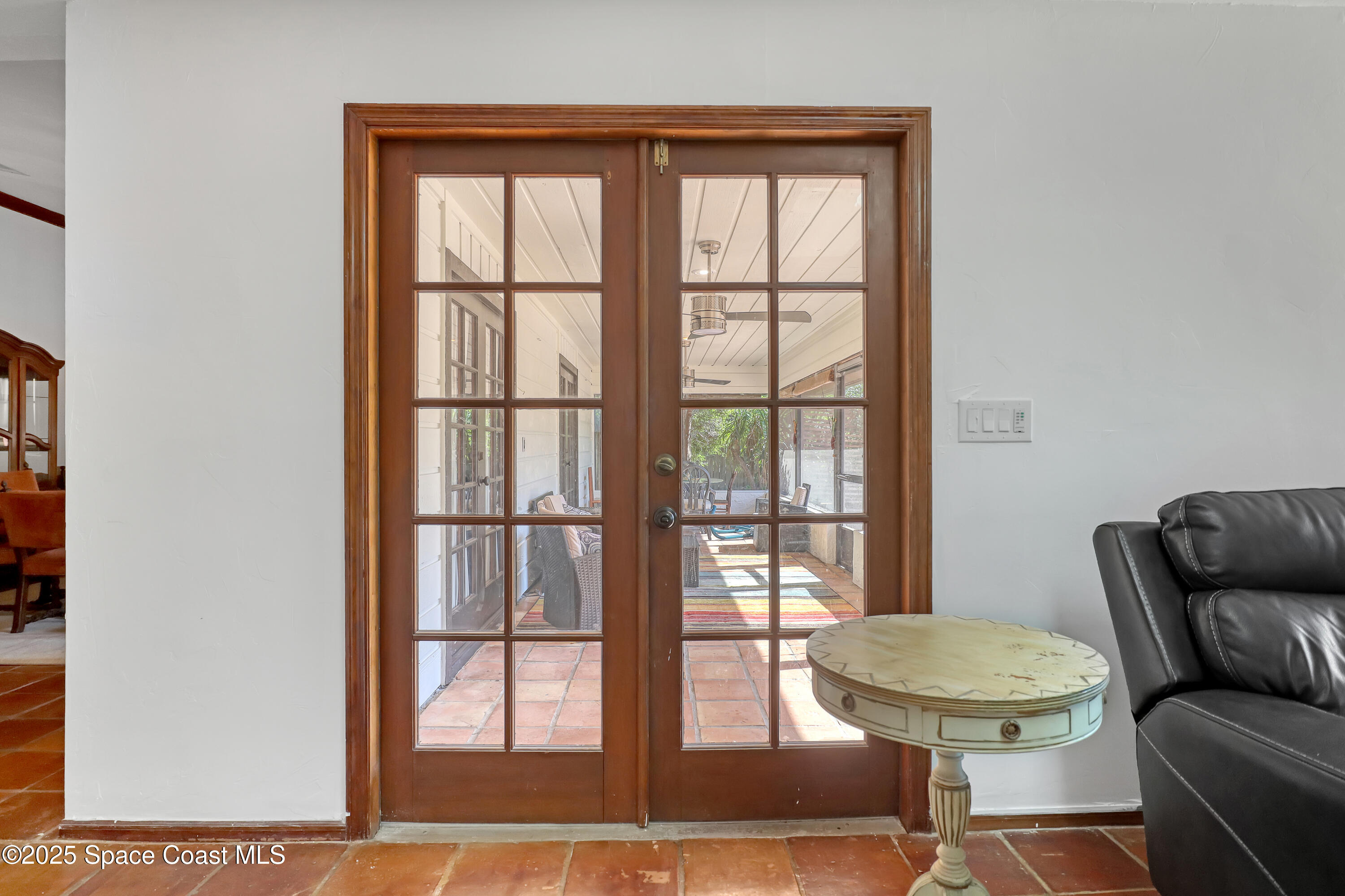 235 Sand Dollar Road Indialantic, FL 32903 - Photo 33 of 64 a living room with furniture and a window