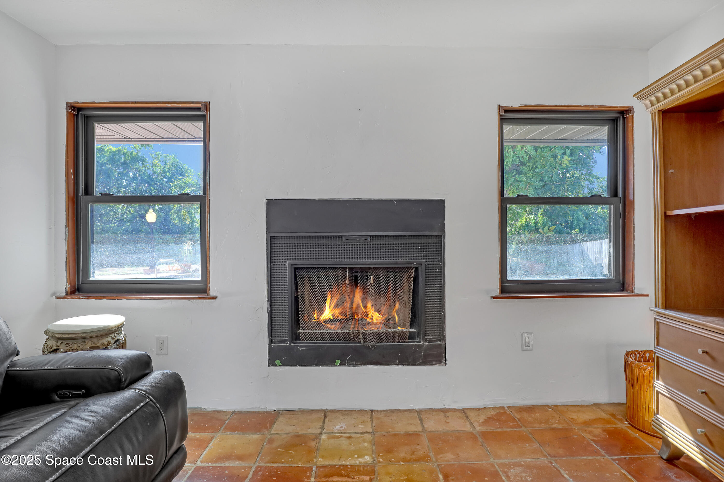 235 Sand Dollar Road Indialantic, FL 32903 - Photo 34 of 64 a living room with furniture and a window