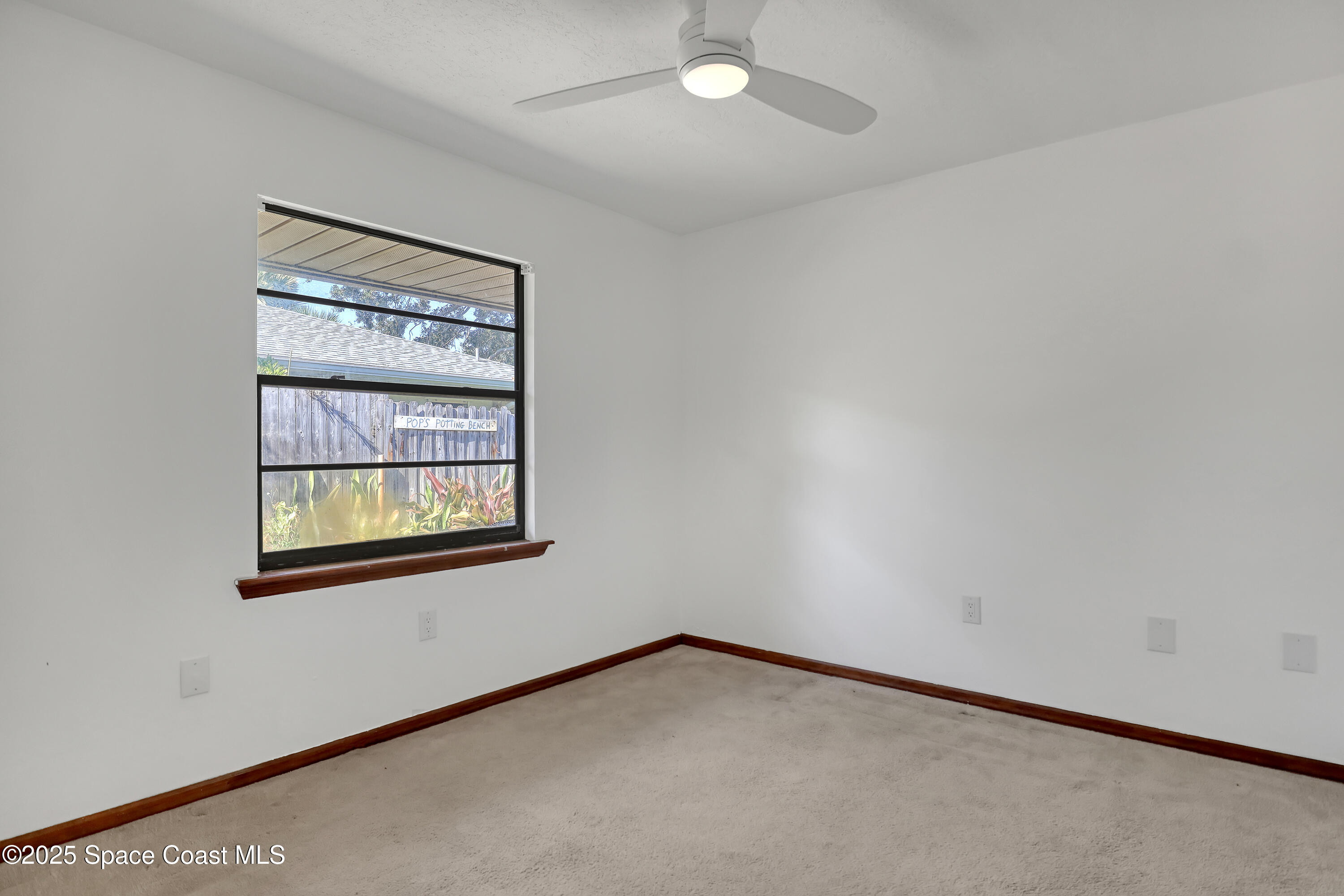235 Sand Dollar Road Indialantic, FL 32903 - Photo 40 of 64 an empty room with a window