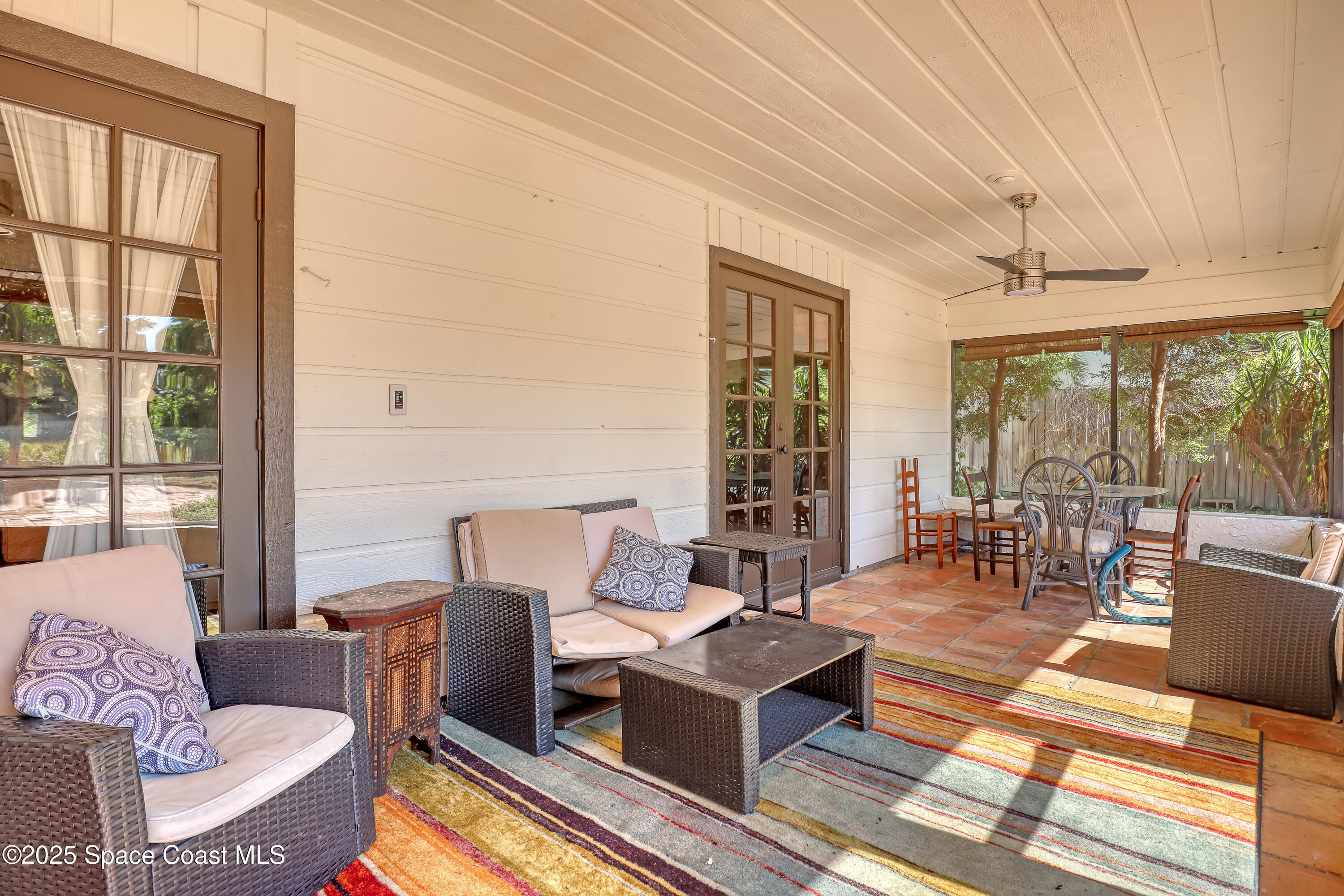 235 Sand Dollar Road Indialantic, FL 32903 - Photo 45 of 64 a living room with furniture and a large window