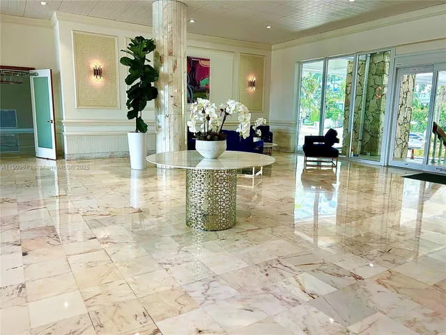 a view of a living room and dining room
