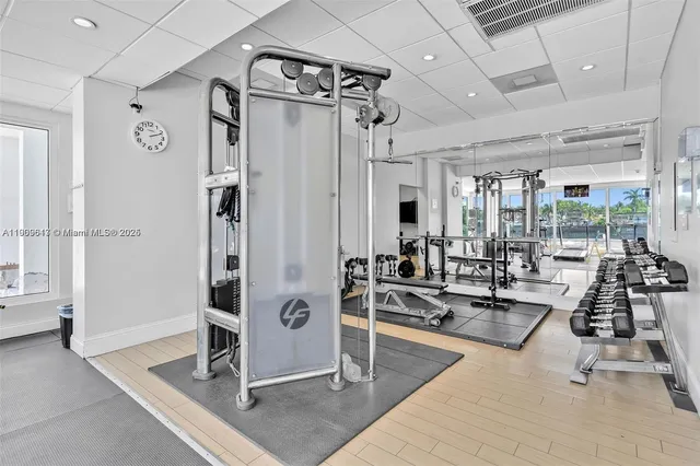 a view of a livingroom with furniture and windows