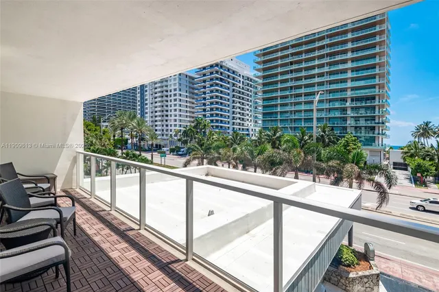 a view of balcony with a potted plant
