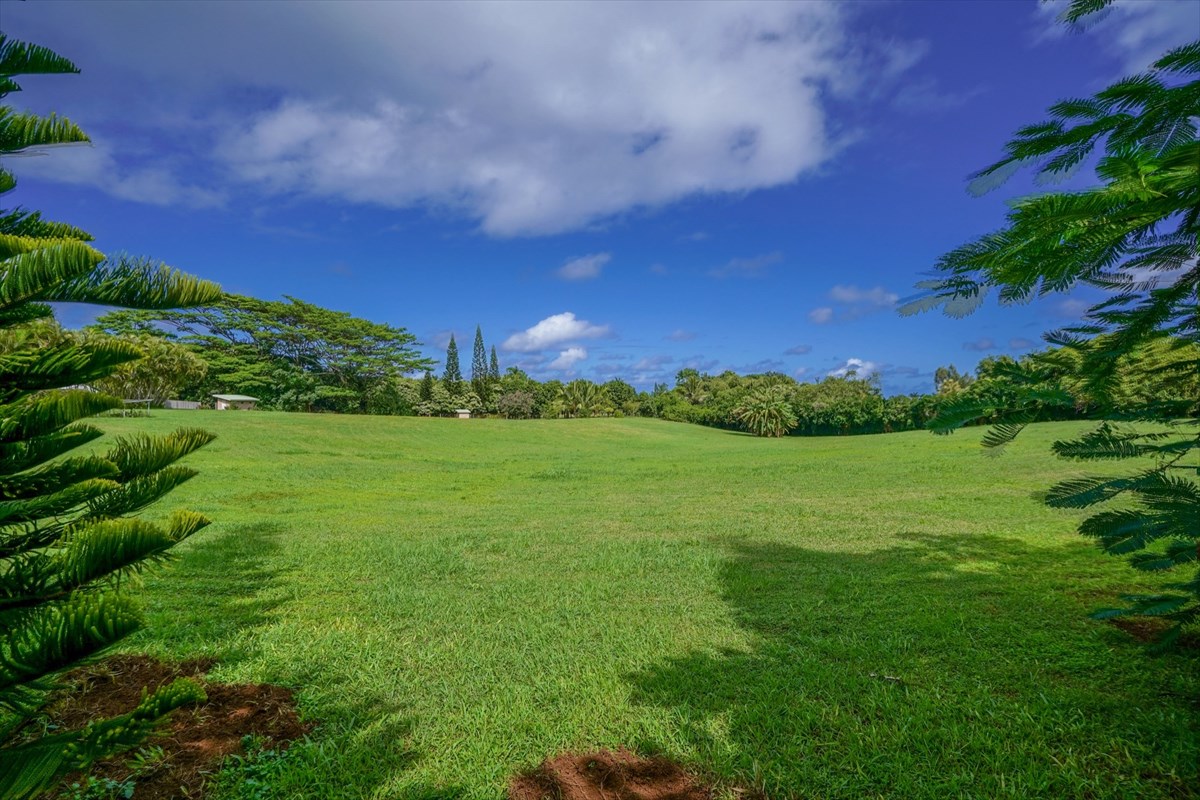 4327 Kapuna Road, Unit 2 Kilauea, HI 96754 - Photo 30 of 30 a view of a building with garden space and street view