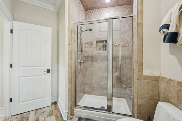 a bathroom with a sink double vanity and a mirror
