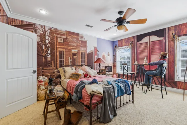 a bed room with a bed and a lamp