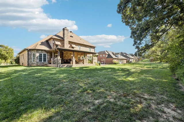 a view of a backyard with a garden