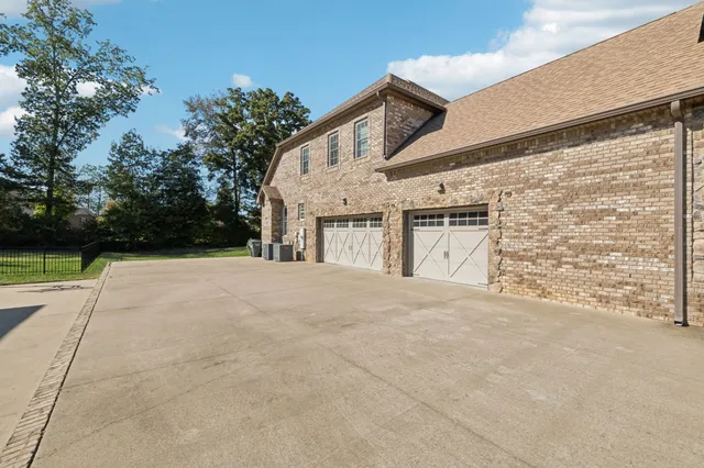 an aerial view of residential building with parking space