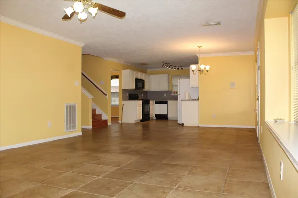 a view of a kitchen with a sink