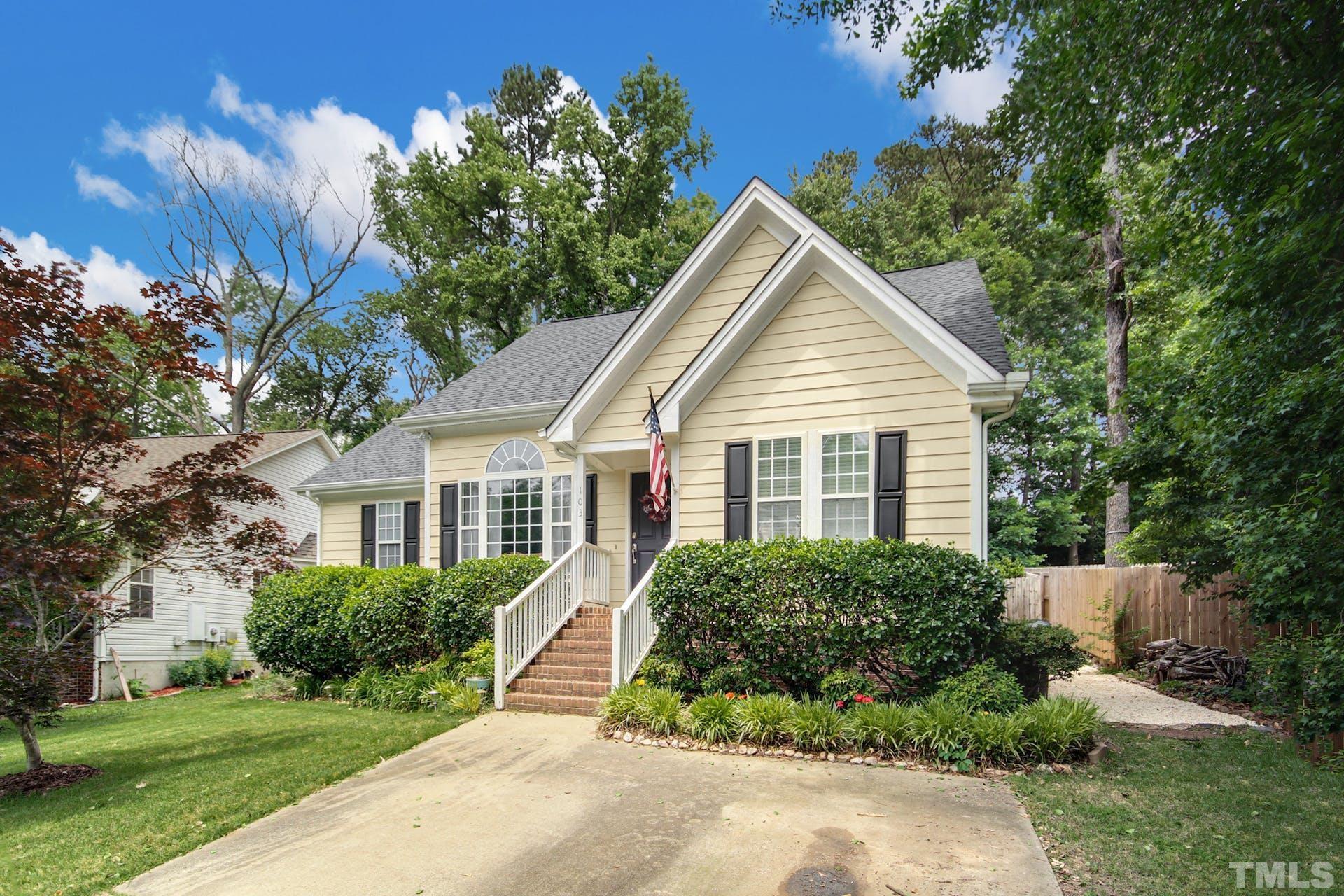 103 Lemon Drop Circle Apex, NC 27502 - Photo 2 of 20 a view of a house with a yard