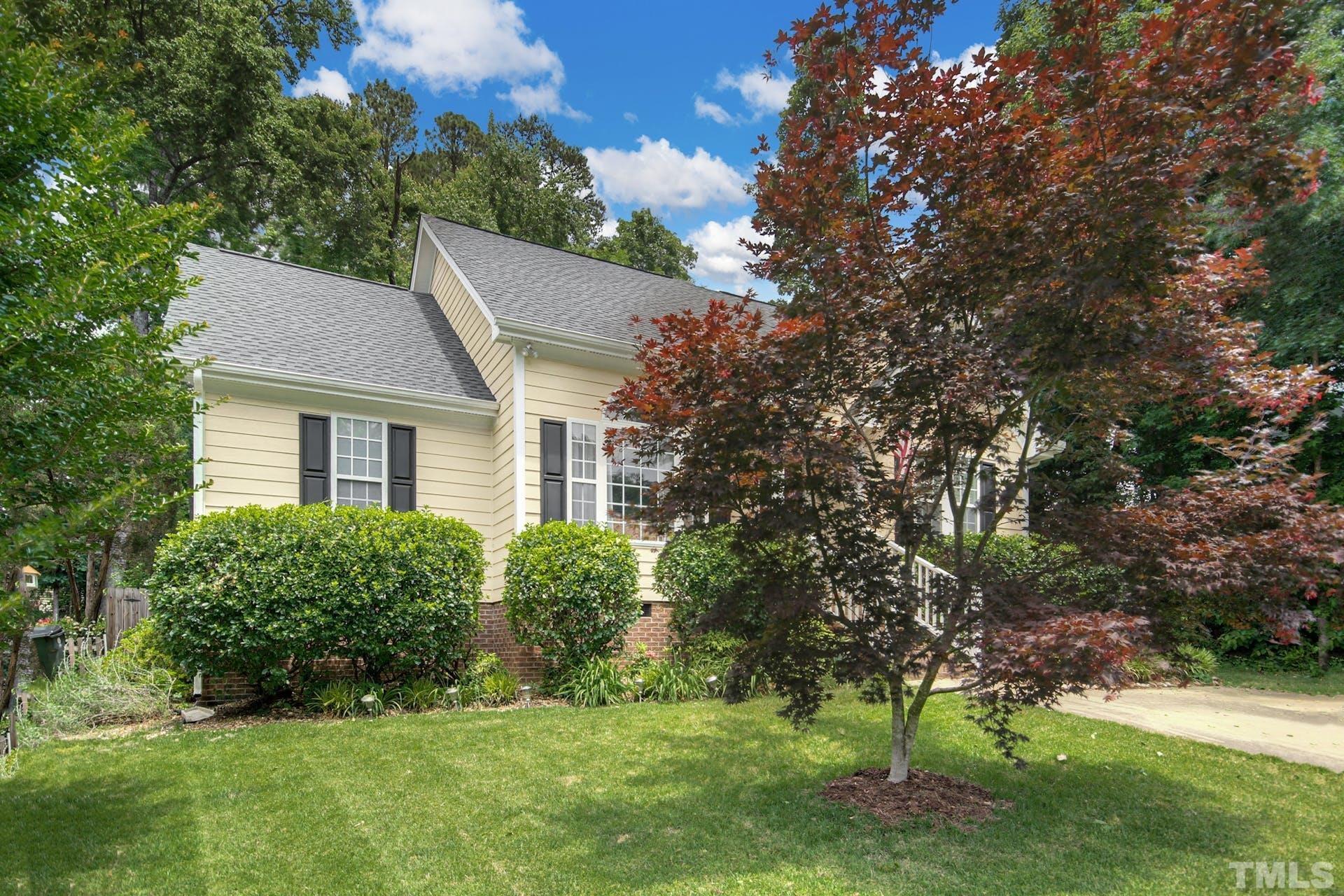 103 Lemon Drop Circle Apex, NC 27502 - Photo 3 of 20 a view of a house with a yard
