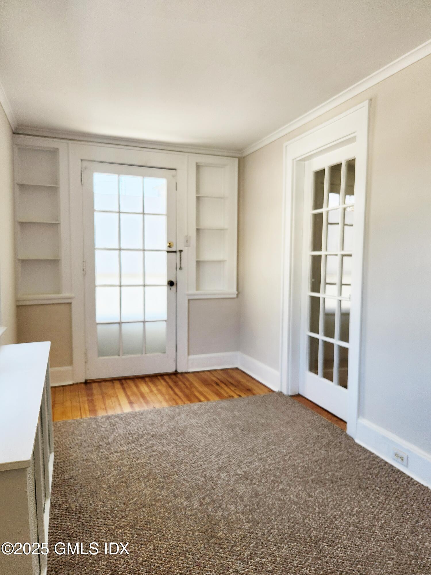 15 Scofield Street, Unit 1F Cos Cob, CT 06807 - Photo 6 of 15 a view of a livingroom with furniture and a window