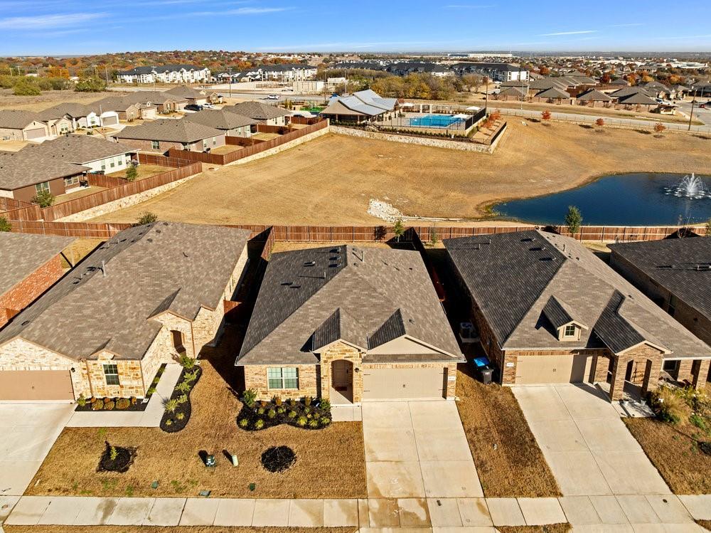 Lovely view of no neighbors behind you! See the pool and fountain!