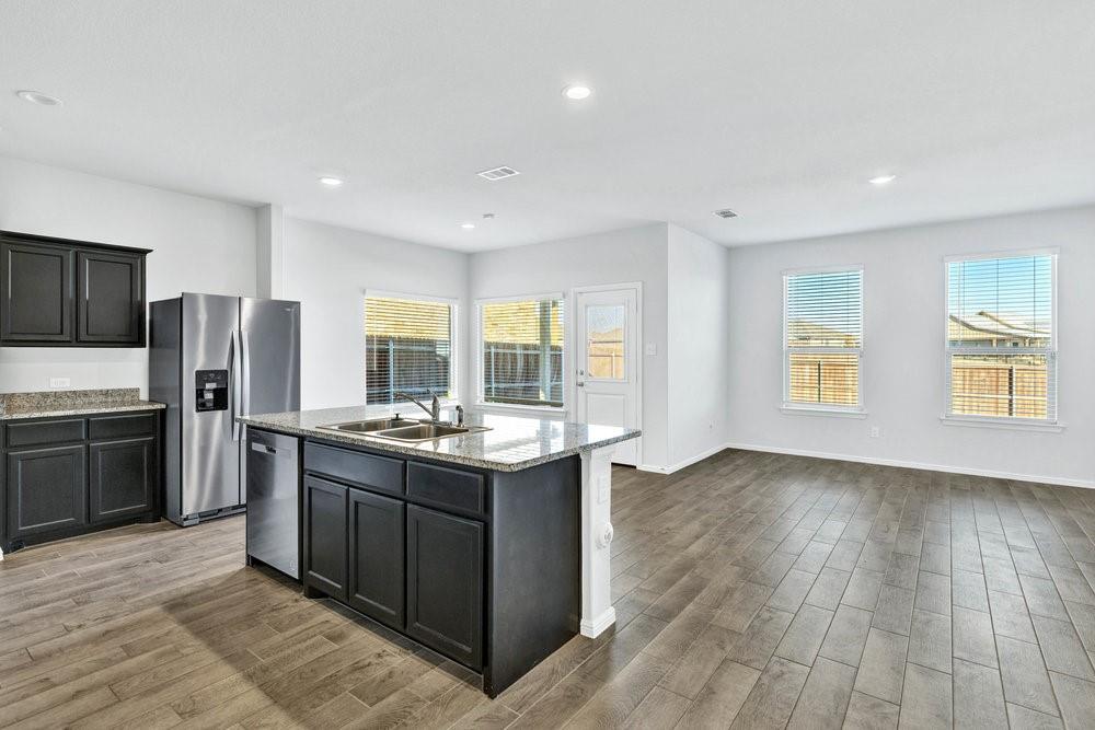 9632 Cherryville Road Fort Worth, TX 76108 - Photo 12 of 40 Kitchen island and open to the living and dining areas.