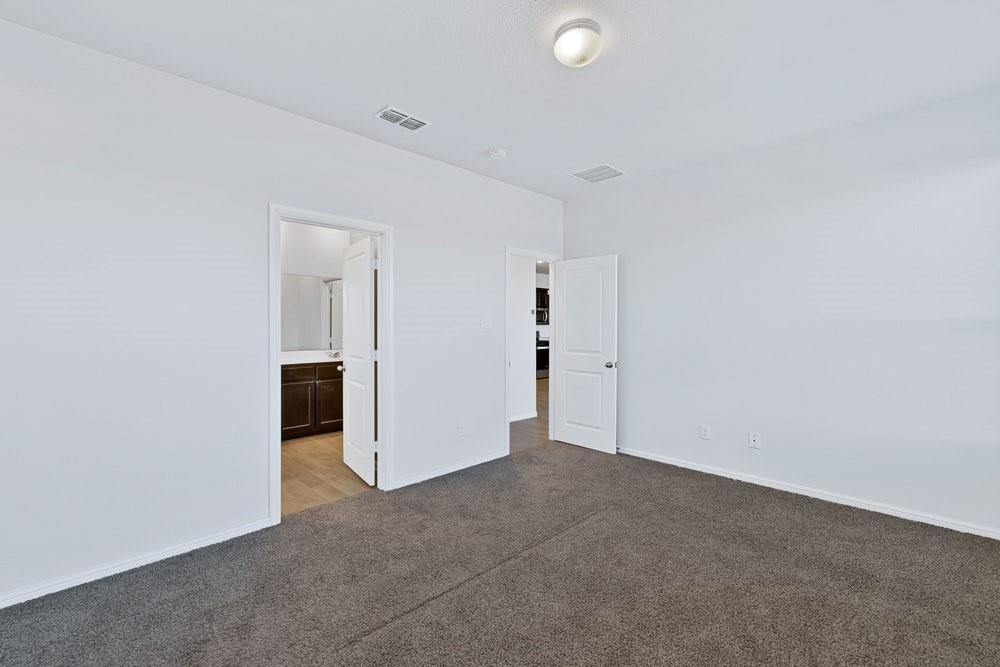 9632 Cherryville Road Fort Worth, TX 76108 - Photo 19 of 40 Spacious primary room with en suite bathroom and walk in closet