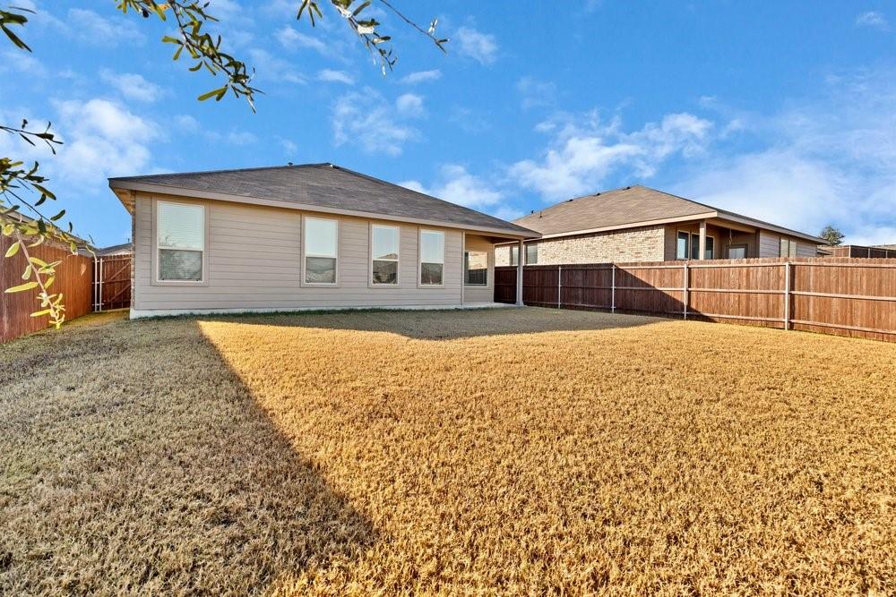 9632 Cherryville Road Fort Worth, TX 76108 - Photo 32 of 40 Covered back porch for relaxing and hanging out
