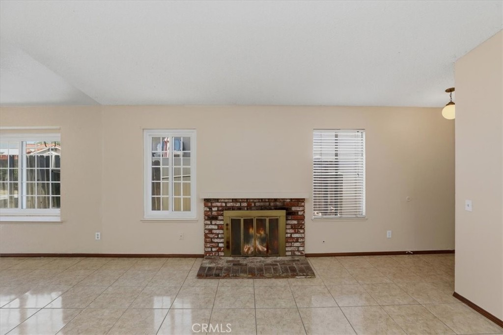 1907 Overland Street Colton, CA 92324 - Photo 11 of 36 an empty room with windows