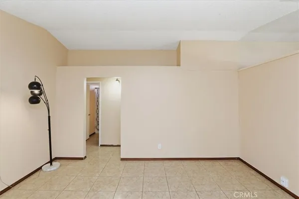 a bathroom with a toilet and shower