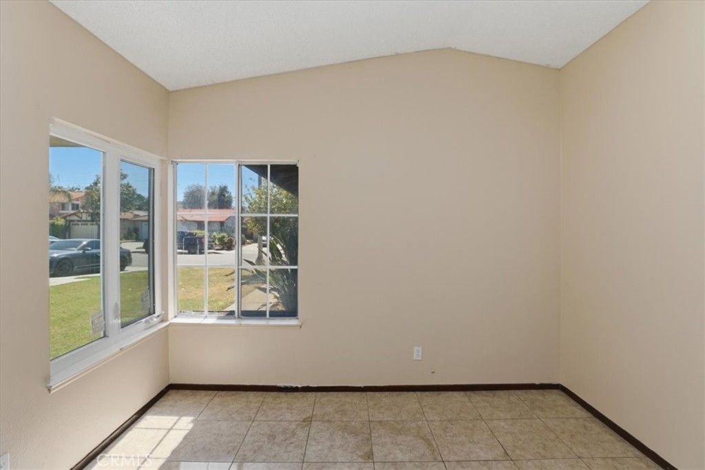 1907 Overland Street Colton, CA 92324 - Photo 18 of 36 an empty room with windows