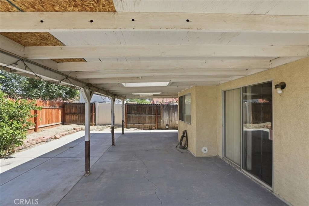 1907 Overland Street Colton, CA 92324 - Photo 24 of 36 a view of a hallway with seating space